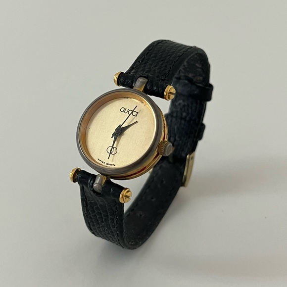 Gucci Accessories - Gucci Vintage Gold and Black Leather Watch Vtg